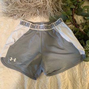 Gray and white under armor shorts